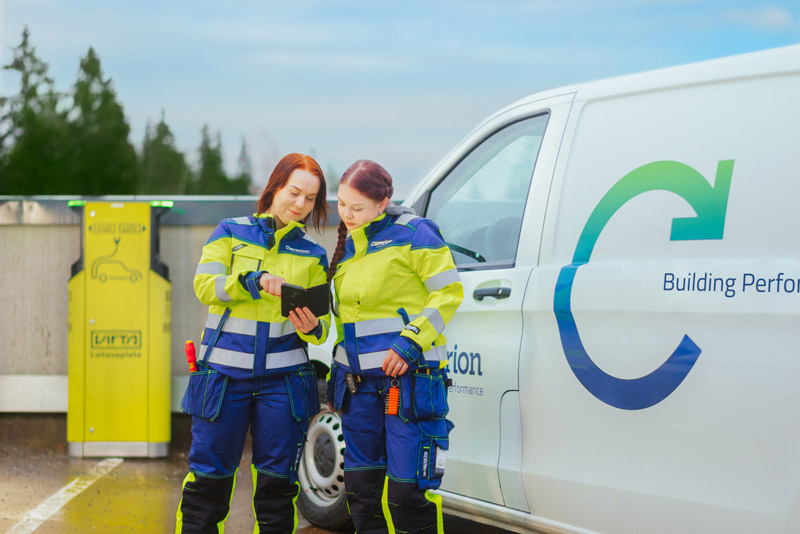service-workers-looking-at-phone.jpg